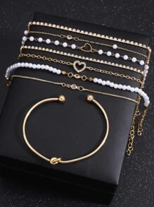 Conjunto de 12 piezas/6 piezas de pulseras superpuestas con diseño de corazón hueco de perlas falsas elegantes, joyería de moda para niñas, apropiado para uso diario en verano