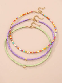 Set da 3 collane da ragazza con perline a forma di stelle, lune e cuori, adatte per vacanze, abbigliamento casual, e decorazione quotidiana