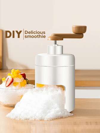 Een zomerse handbediende ijsschaaf, ideaal voor het maken van verfrissende ijshoorntjes, geschaafd ijs en ijs. Draagbare handmatige ijscrusher, inclusief ijsblokjesvorm, ideaal voor thuisbijeenkomsten en zomerdesserts.