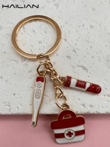 Colgante de herramienta médica de aleación, diseñado para médicos y enfermeras, incluye ambulancia, uniformes de médico y enfermera, herramientas médicas comunes, adecuado como dije de bolso, llavero de coche, regalo para estudiantes de medicina/enfermería, familia, amigos y seres queridos - Blanco - Ver 6