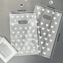 50 Pcs Frosted Heart-Shaped Pattern Gift Bags, Creative Tote Bags, Small Gift Packaging Bags DIY Gift Bags, Ladies' Summer Gift Bag, Accessory Tote Bag, Transparent Tote Bag,Used For Holiday, Birthday, Wedding, Party Gift Packaging Bags. ﻿ - Multicolor - View 3