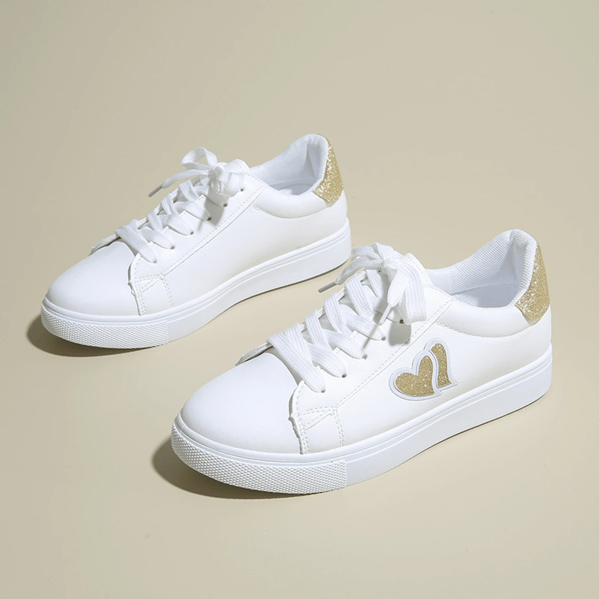 女士春秋新款时尚金心设计系带休闲舒适白色运动鞋