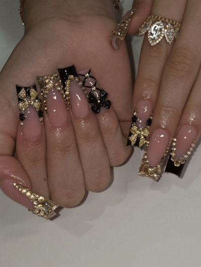 10 Stück handgefertigte Aufklebe-Nägel für Frauen - Vollständige Abdeckung, wiederverwendbare quadratische Kunstnägel mit schwarz-goldenen französischen Spitzen, funkelnde Strass-Verzierungen, mit Gelee-Kleber und Nagelfeile Nagelbedarf