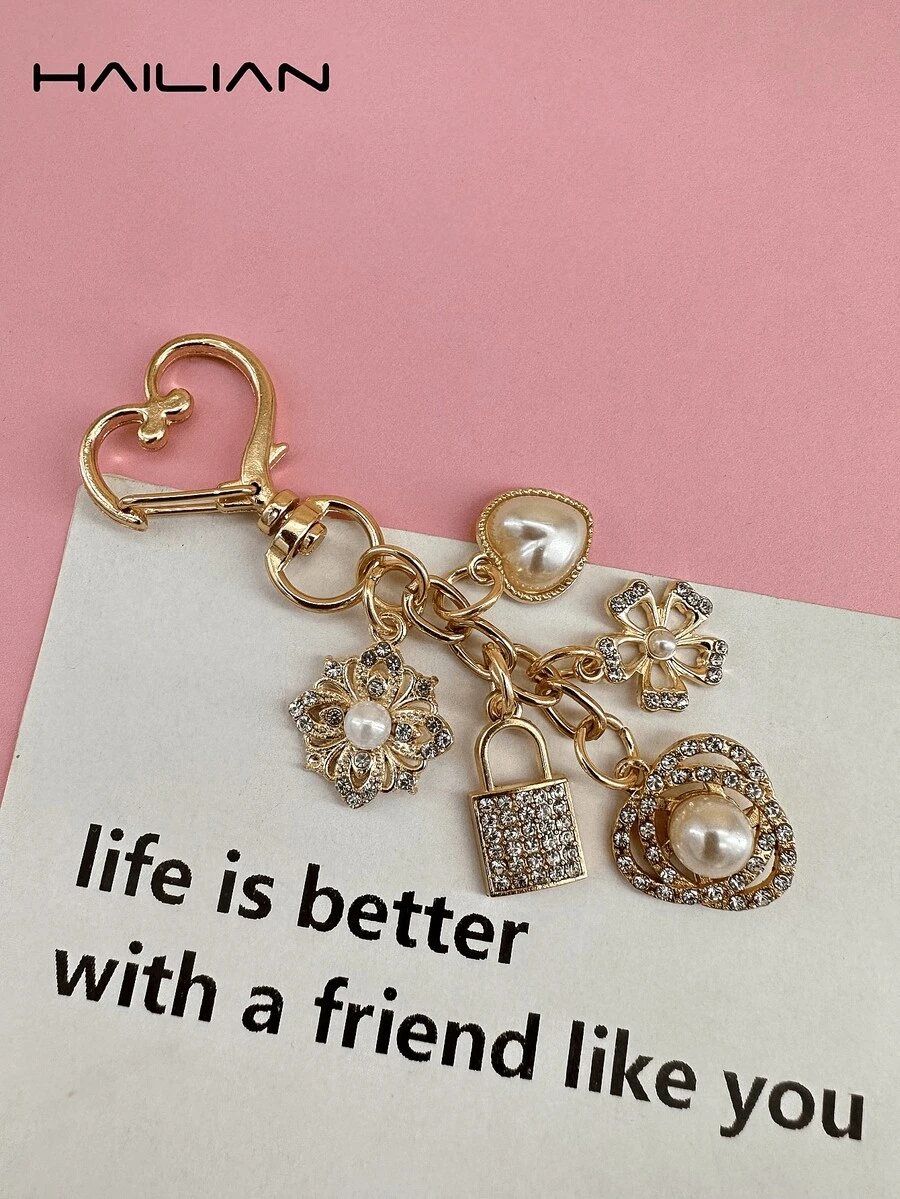 HAILIAN A Bag Pendant Made Of Alloy With Flowers, Pearls And Locks, Inlaid With Diamond Five-Petal Flowers, Round Pearls And Beautiful Hearts. It Can Be Used As A Bag Pendant, Car Keychain, Or As A Small Gift For Family, Friends And Lovers. - Gold - View 1