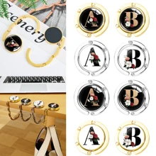 1 PC Glass Patches Initial Letter Zinc Alloy Foldable Bag Hanger Hook Purse Hook Handbag Hanger Table Hook Holder With Fashionable Letter Glass Patches A-Z, Floral Letter Design, Desktop Wallet Holder, Fashion Handbag Rack And Ladies Office Desk Organizer, Better Protection And Display Of Your Bag