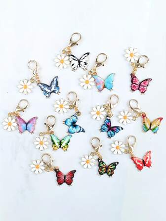 12 pezzi set di portachiavi con ciondoli colorati a forma di farfalla e margherita, pendenti per borse, catene per borse, decorazioni per borse, design a tema animali alla moda, adatti come pendenti per borse, portachiavi, portachiavi per auto, perfetti come regali per le vacanze, regali perfetti per la Festa della Mamma, la Festa del Papà, l'inizio del nuovo semestre e la stagione delle lauree