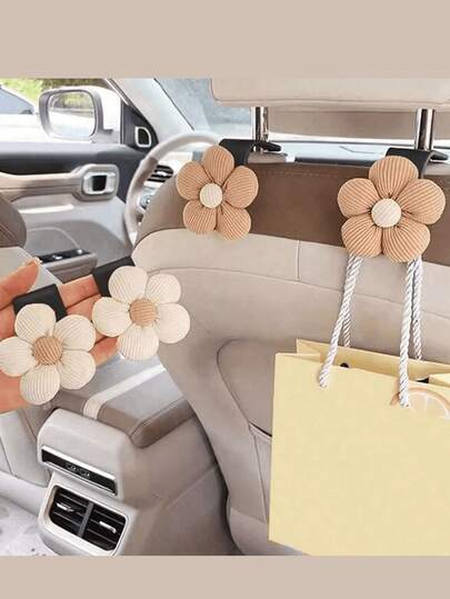 2 piezas Gancho pequeño con flor para coche Gancho multiuso para el respaldo del asiento del coche Suministros de decoración y almacenamiento para el automóvil