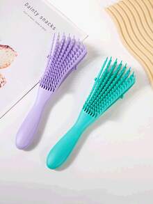 2025年新款卷发梳，适合卷发造型。你的秀发需要它。这是一款男女皆宜的卷发梳，能够塑造和梳理卷发，减少拉扯和卷发分离。