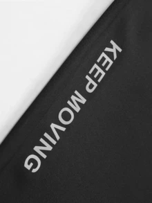 1条男士时尚户外运动裤，独特侧边印花装饰，实用拉链口袋，舒适弹力设计，支持动态运动。适合户外活动、旅行、健身、日常穿着、外出、居家和外出就餐。