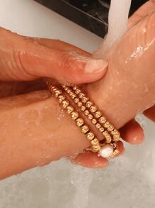 1 Stück goldfarbenes Edelstahl wasserdichtes Perlen Dehnbar Armband für Frauen, nicht anlaufend, stapelbar, kugelförmiges Perlen Design, Geschenk (Perlenanzahl zufällig)