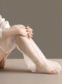 10 piezas = 5 pares de película desechable para los pies con cubierta de la planta del pie Película transparente para el cuidado de los pies Película de plástico PE de tubo largo Cubierta impermeable para los pies, máscara para la pierna con cubierta para el pie y la pierna, alta transparencia impermeable y humectante Cubierta para el cuidado de los pies. (Las bandas de goma son de colores aleatorios.)