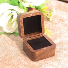 1 pieza Estuche de joyería de madera portátil, una pequeña caja de joyería adecuada para mujeres, un organizador de joyería para el hogar sencillo, un organizador de viaje y una caja de almacenamiento mini exquisita que puede contener aretes.