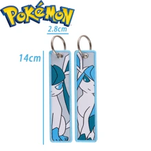 pocket monsters 1 pièce Porte-clés de personnage de dessin animé, pendentif brodé élégant, accessoire de mode et cadeau pour hommes et femmes. Accessoire de voiture, charm de sac à dos pour l'école