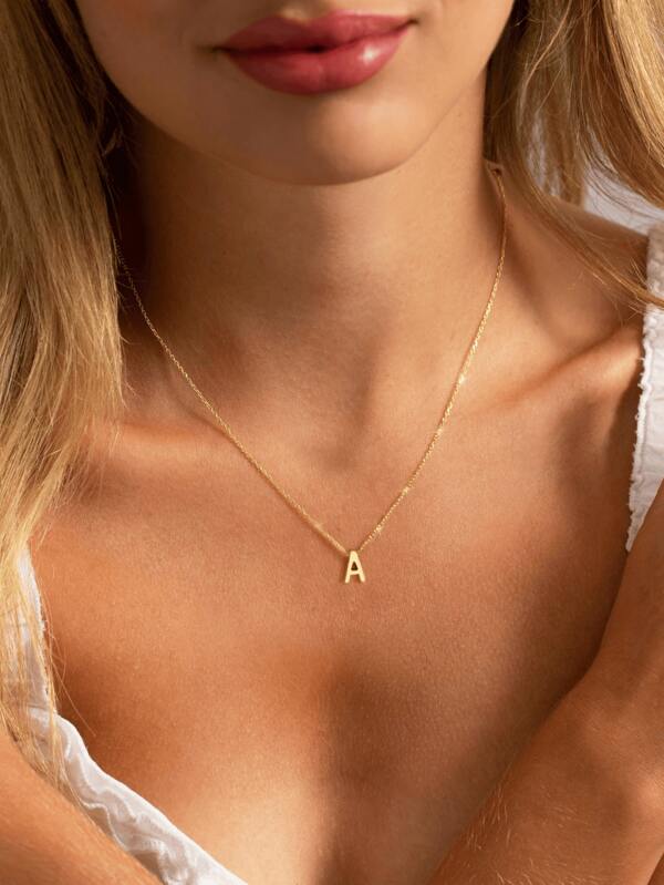 1 pièce Collier pendentif en forme de O minimaliste à lettre perforée en acier inoxydable, un bijou délicat, élégant et polyvalent pour femmes et filles