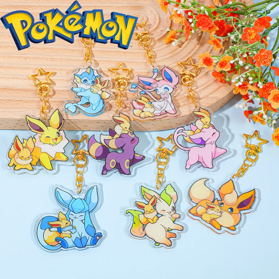 pocket monsters 宝可梦主题亚克力钥匙扣吊坠：多种造型的伊布，设计为拥抱伊布形象吊坠，完美搭配背包配饰。学校背包、汽车配饰、可爱哥特风、Y2K 圣诞礼物创意、包袋配饰、带身份证夹的挂绳、汽车配饰、包袋挂饰