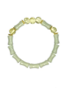 Una pulsera elástica de cuentas transparentes con cadena de bambú articulado, elegante y sofisticada, que simboliza la riqueza y la prosperidad. Adecuada para el uso diario, ocasiones de citas y un regalo pequeño y delicado.
