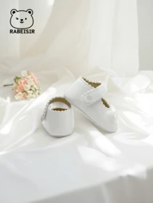 春秋時節的寶寶第一雙閃亮系帶行走鞋,時尚的簡約珍風格平底鞋,帶有蝴蝶結,適合室內和室外活動。