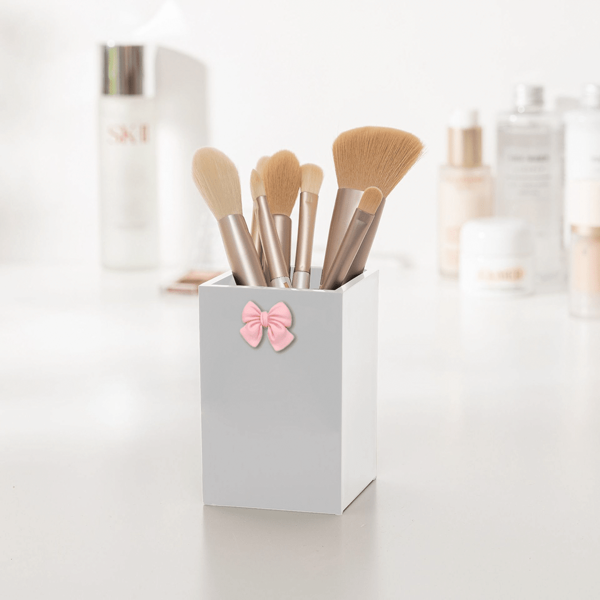 1 pieza Caja de almacenamiento de maquillaje y caja de almacenamiento con decoración de lazo para dormitorio, para almacenar brochas de maquillaje, accesorios de escritorio, artículos de baño y accesorios de dormitorio.