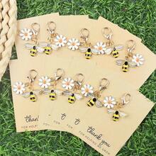 Set de 4 llaveros con dijes de margarita y corazón que dicen "Gracias por ayudarme a crecer" - Perfecto para agradecer a maestros, familia y amigos | Ideal para cumpleaños, graduaciones, bodas, accesorios escolares, accesorios góticos y de Y2K, ideas de regalo para el Día del Maestro, Navidad, accesorios para bolsos, portaidentificaciones, accesorios para autos - Multicolor - Ver 16