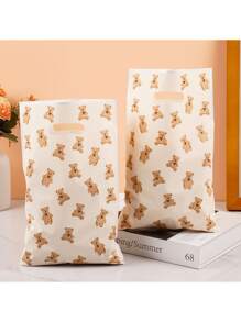 30 件卡通可爱泰迪熊礼品袋，塑料礼品手提袋，简约风格泰迪熊主题设计，适用于婚礼、生日派对用品、结婚礼物、礼品分发袋和廉价物品 - Yellow Bear - 查看 2