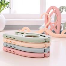 8个可折叠衣架 - 超便携旅行衣架，可悬挂内衣和袜子，节省空间的折叠晾衣架，可扩展的洗衣收纳架，适用于宿舍和家庭，轻便耐用的衣架系统，紧凑的衣柜解决方案，适合忙碌的生活方式，是小型公寓、旅行、办公室和酒店住宿的理想之选，防滑手柄，易于组装，保持衣柜整洁有序。 - 彩色 - 查看 2