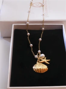 1 pièce Style bohème Collier polyvalent à la mode avec pendentif étoile de mer, coquillage, éléments océaniques et fausses perles. Convient comme cadeau de bijoux pour les femmes à porter de manière décontractée, pour les fêtes, les voyages, les vacances à la plage