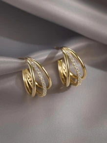 1 par de pendientes con forma de C con 3 hileras de circonita incrustada en cobre