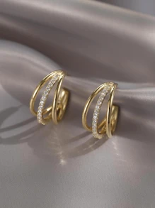 1 par de pendientes con forma de C con 3 hileras de circonita incrustada en cobre