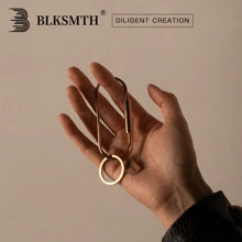 BLKSMTH BLKSMTH BRASS PENDANT IN THE SHAPE OF A PAPER CLIP
