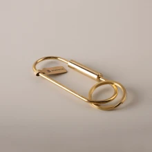 BLKSMTH BLKSMTH BRASS PENDANT IN THE SHAPE OF A PAPER CLIP