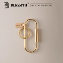 BLKSMTH BLKSMTH BRASS PENDANT IN THE SHAPE OF A PAPER CLIP