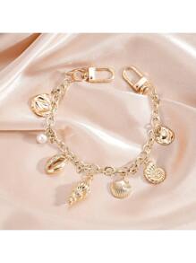 Ozean Charm, Ozean Taschencharm, goldfarbener Ozean Stil Taschencharm, dekorativer Zubehör, dekorative Taschenkette, Taschenverlängerung, Ersatzkette mit Charm, geeignet für Handtaschen, Shopper, Umhängetaschen, Schultertaschen, goldfarbener Ozean Stil Schlüsselanhänger mit Fischschwanz und Seestern Charm - elegantes Golddesign, modisches Taschenausstattung | Stranddekoration | Druckknopf