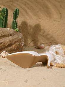 On feet& in love 女士时尚优雅蝴蝶结尖头镂空后绑带细高跟鞋，适合礼服、婚礼