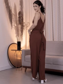 LONG OVERALL WITH THIN STRAP WITH ADJUSTABLE BOW AT THE WAIST WITH PADS