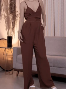 LONG OVERALL WITH THIN STRAP WITH ADJUSTABLE BOW AT THE WAIST WITH PADS