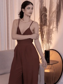 LONG OVERALL WITH THIN STRAP WITH ADJUSTABLE BOW AT THE WAIST WITH PADS