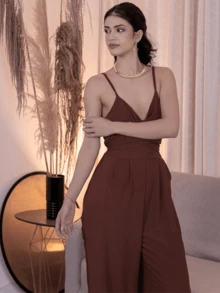 LONG OVERALL WITH THIN STRAP WITH ADJUSTABLE BOW AT THE WAIST WITH PADS