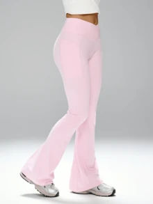 FWH 交叉腰带设计收腹，隐形侧袋方便收纳必需品，优雅喇叭裤型，#裸感时尚 #运动休闲必备 #办公休闲，全天舒适，高级基础款，收腰显瘦，视觉拉长腿部线条，收腹运动紧身裤，交叉腰带运动裤，必备高腰瑜伽裤，全天运动表现，带口袋的喇叭瑜伽裤