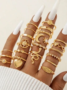 28 Stücke Set goldfarbener einfacher Strass-Herz-, Wellen-, und geometrischer Fingerringe, geeignet für den täglichen Gebrauch und Festivals von Frauen