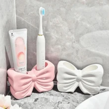 Giá đựng bàn chải đánh răng hình nơ, kệ đựng bàn chải đánh răng và mỹ phẩm dễ thương, đồ trang trí nơ cá nhân hóa, phụ kiện để bàn phòng tắm, đồ dùng phòng tắm gia đình (Hồng/Trắng), cũng có thể dùng làm bình hoa để bàn. - Nhiều màu - Xem 6