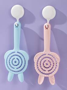 Un peigne à cheveux portable conçu sous la forme d'un petit lapin, qui peut masser le cuir chevelu et convient aussi bien aux cheveux secs que mouillés. Il est idéal pour les voyages, l'utilisation à la maison et les sorties, et fait un excellent cadeau pour la Saint-Valentin.