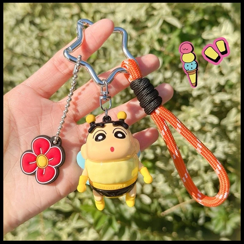 Crayon Shin-Chan Classic Style Wristband Clips - Adorable Collectible Clips Featuring Shin-Chan's Most Iconic Looks! These Versatile Clips Can Be Used To Decorate Backpacks, Pencil Cases, Keychains, Or As Fun Bag Charms. Made With Durable Materials, They're Perfect For Showing Off Your Love For This Mischievous Character Wherever You Go! - Orange - View 1