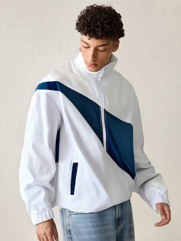 Yemwry Chaqueta estilo deportivo con bloque de color y empalmes, una prenda de moda imprescindible para hombres con estilo