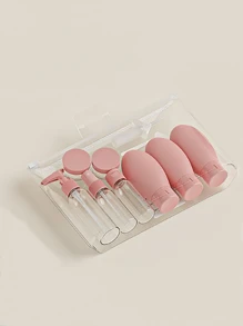 11件套粉色旅行化妆瓶套装，包括塑料乳液瓶、爽肤水瓶、喷雾瓶和洗发水瓶