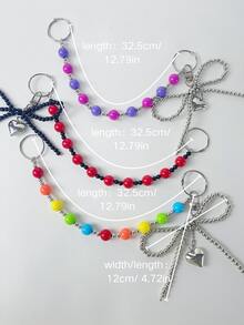 قطعتان من سحر الحقيبة بشكل فيونكة فضية، سلسلة حقيبة من اللؤلؤ الاصطناعي، قلادة محفظة، ديكور حقيبة اليد، سلسلة مفاتيح محفظة، اكسسوارات حقيبة، سحر حقيبة يد مصمم جميل، ديكور حقيبة DIY، مناسب لحقائب Bogg - الأسود - مشاهدة 10