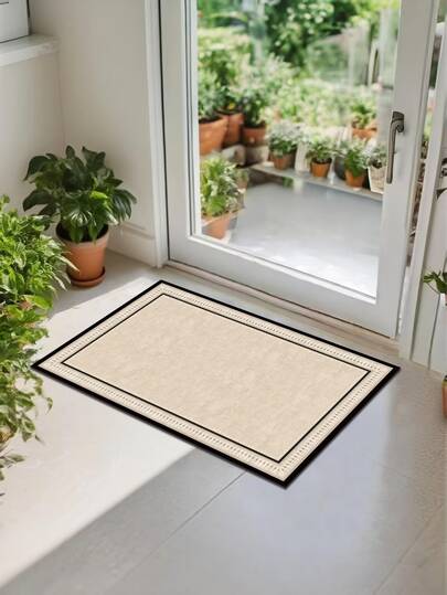 This Carpet Features A Light Beige Background With Black Rectangular Borders Forming A Square Pattern, In A Modern Minimalist Style. It Has Shock-Absorbing And Anti-Fatigue Functions, With A Thickness Of Approximately 3mm, Super Soft Touch, Strong Water Absorption, Lightweight And Breathable. Made Of Polyester Fiber Material, With A Rubber Lining On The Back, It Is Durable And Comfortable.