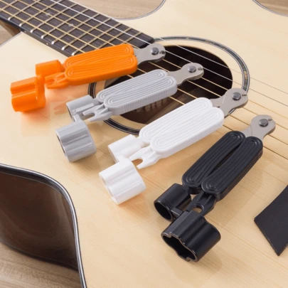 Bộ dụng cụ thay dây đàn guitar 3 trong 1: 1 cái, bao gồm dụng cụ quấn dây, tháo chốt dây và cắt dây, phụ kiện nhạc cụ.
