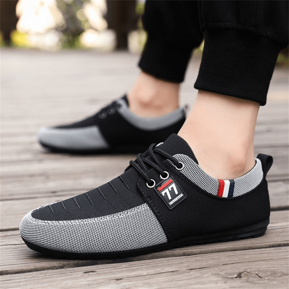Par de zapatos de lona de bajo corte versátiles para hombre, transpirables, antideslizantes y duraderos para uso casual, deportivo y formal. Se recom