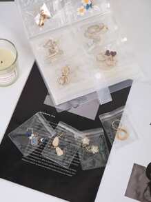 1本哑光透明首饰收纳册，内含30个防氧化收纳袋，适合收纳首饰、小饰品、耳环，是旅行、夏季、开学季的理想之选。 - 無色 - 查看 5