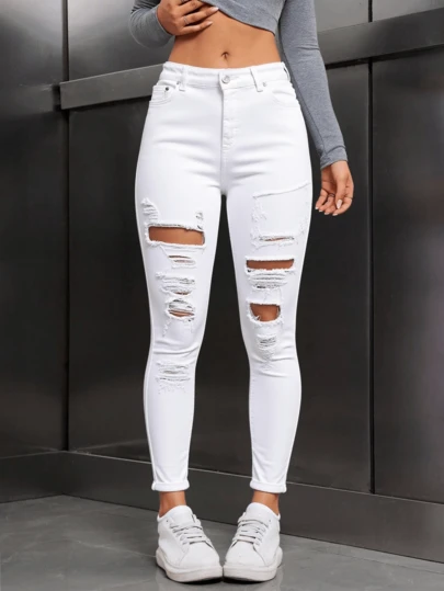 Jeans pitillo de talle alto y rotos